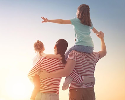 Family Looking at Sunset